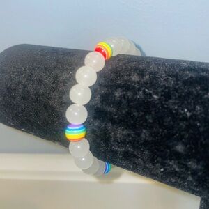 Handmade rainbow and white glass bead bracelet